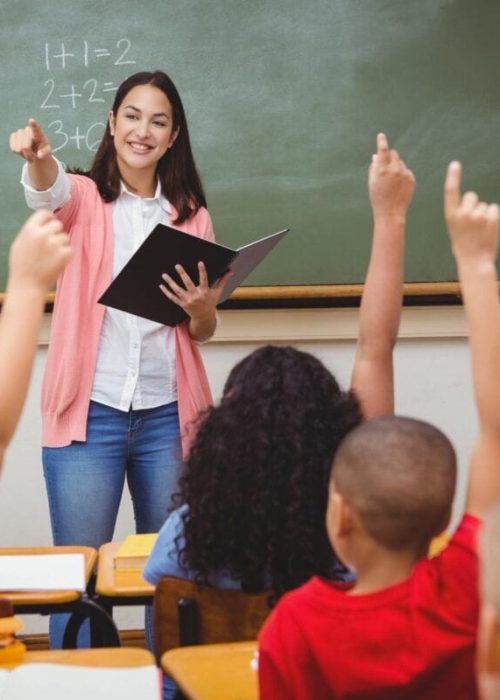 Teacher asking her students a question